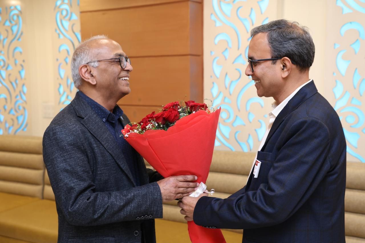 With Dr. Pawan Sinha